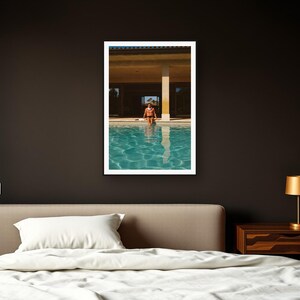 Poolside Athlete Wall Art art print framed in a dark luxury bedroom