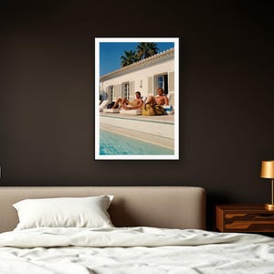 Poolside Athletes Wall Art art print framed in a dark luxury bedroom