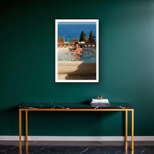 Ice Bath Wall Art art print on a brass and black console vignette