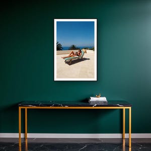 Sun Lounger Wall Art art print on a brass and black console vignette