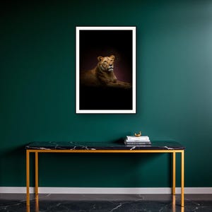 Lioness Wall Art III art print on a brass and black console vignette