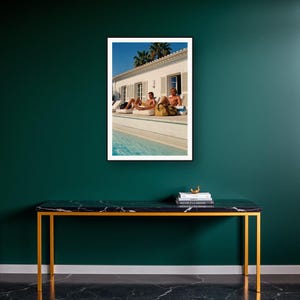 Poolside Athletes Wall Art art print on a brass and black console vignette