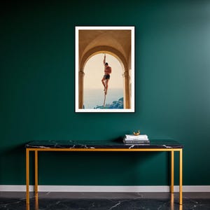 Rope Climb Wall Art art print on a brass and black console vignette