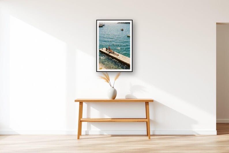 Rowing Wall Art art print displayed above an entry console table