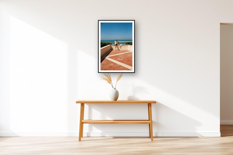 Athlete Stretching Wall Art art print displayed above an entry console table