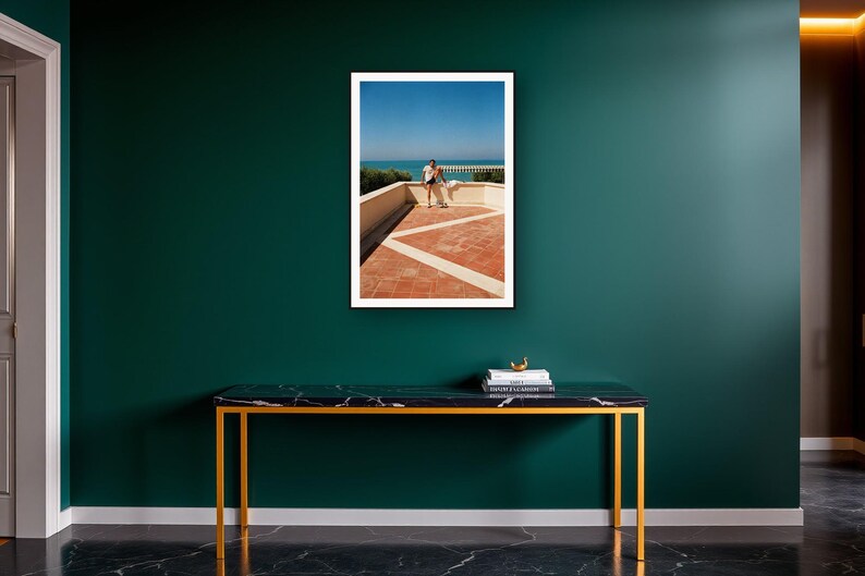 Athlete Stretching Wall Art art print on a brass and black console vignette