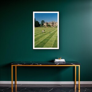 Springer Spaniel Wall Art art print on a brass and black console vignette