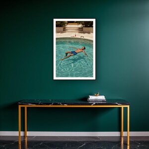 Pool Float Wall Art art print on a brass and black console vignette