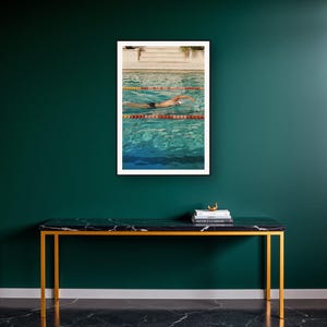 Swimmer Wall Art art print on a brass and black console vignette