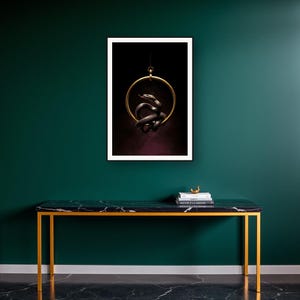 Serpent Wall Art III art print on a brass and black console vignette