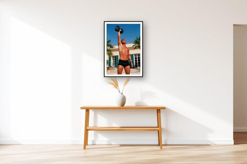 Dumbbell Press Wall Art art print displayed above an entry console table