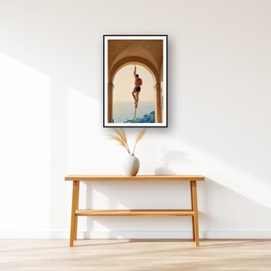 Rope Climb Wall Art art print displayed above an entry console table