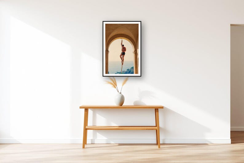 Rope Climb Wall Art art print displayed above an entry console table