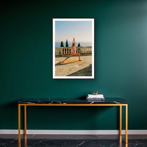 Yoga Wall Art art print on a brass and black console vignette
