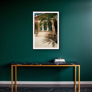 Vintage Bicycle Wall Art art print on a brass and black console vignette