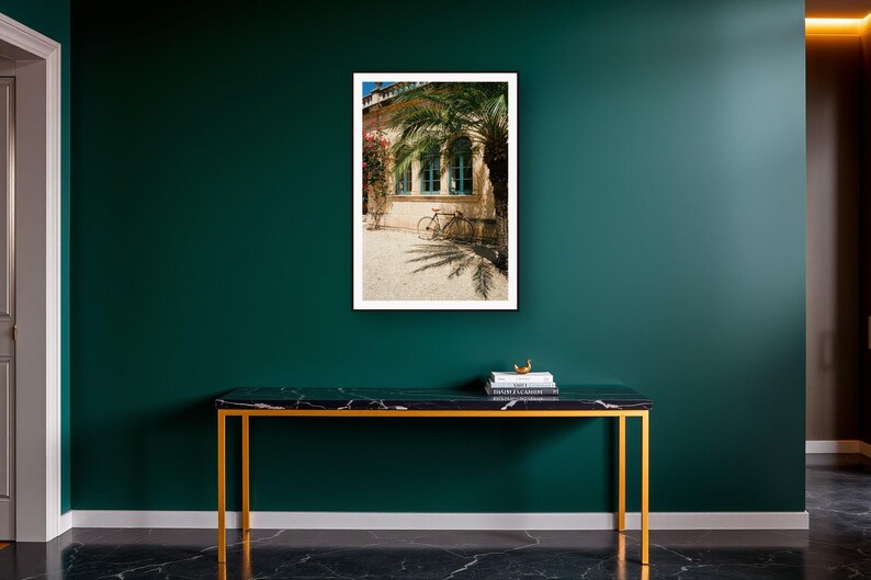 Vintage Bicycle Wall Art art print on a brass and black console vignette