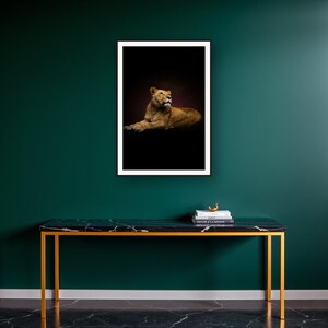 Lioness Wall Art II art print on a brass and black console vignette