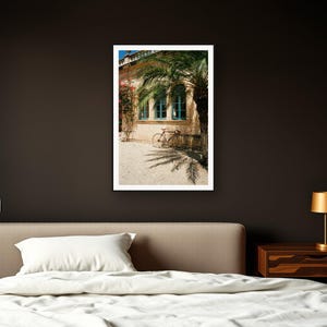 Vintage Bicycle Wall Art art print framed in a dark luxury bedroom