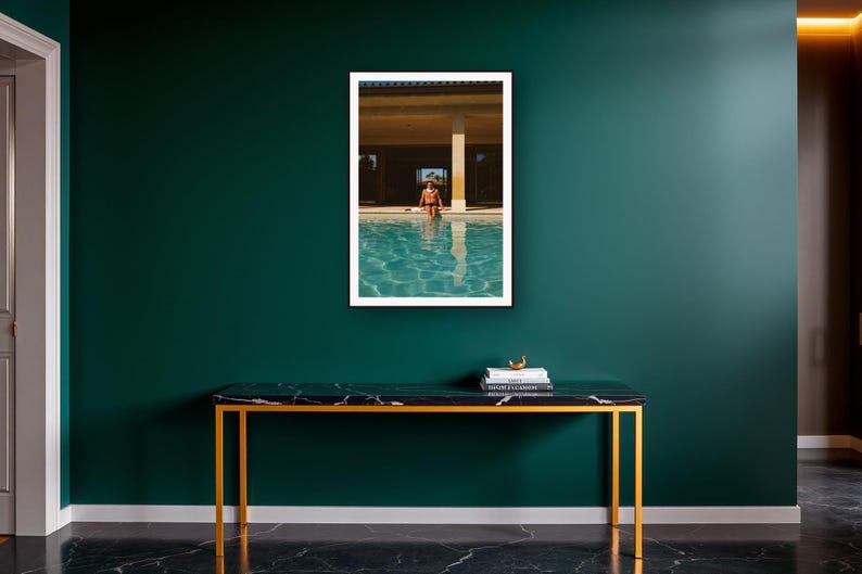 Poolside Athlete Wall Art art print on a brass and black console vignette