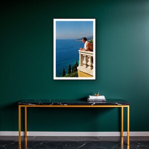 Athlete Wall Art art print on a brass and black console vignette