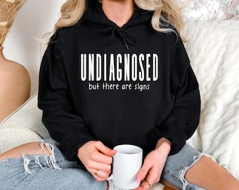 Undiagnosed Hoodie Sweatshirt | Humorous Hoodie | Sarcastic Funny Sweater | Unique Gift Idea | Minimalist Apparel | Cozy Hoodie Pullover