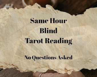 May include: A lit orange candle sits on a wooden surface, with a torn paper overlay featuring the text "Same Hour Blind Tarot Reading, No Questions Asked." A hand with a ring is visible.