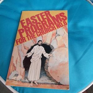 May include: A yellow booklet with the title "Easter Programs for the Church No. 6" in red letters. The cover features an illustration of Jesus emerging from a tomb.