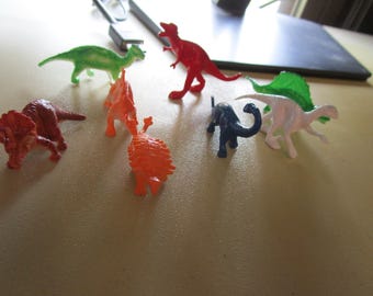 Lot of 8 Plastic Dinosaurs for a cake topper or pretend play