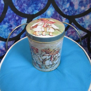 Vintage Round Tin Can with Darling Boys and Girls around it
