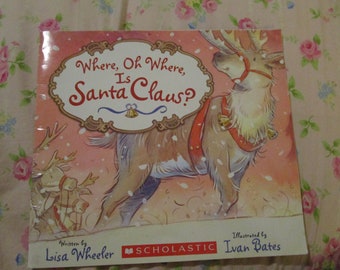 Where oh where is Santa Claus by Lisa Wheeler Illustrated by Ivan Bates Scholastic SC Book