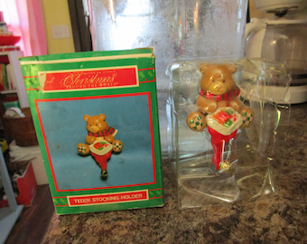 Details about   Christmas Stocking Hanger Holder Santa Teddy Bear 