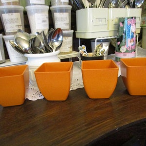 Vintage set of 4 Small Orange Resin Planters or Other Cups Holders