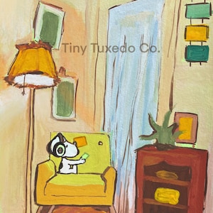 May include: A colourful painting shows a cartoon dog with headphones and a green object, in a yellow armchair. The scene includes a floor lamp, a red cabinet, and the text "Tiny Tuxedo Co."