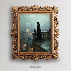 May include: Ornate, gold-toned framed print featuring a gothic scene. The artwork depicts a figure in black with a black cat on a balcony overlooking a city at dusk. The frame has detailed floral and scrollwork.