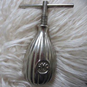HMQ Nickle Plated Nutcracker 1940's