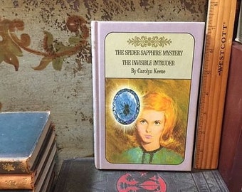 The Invisible Intruder by Carolyn Keene