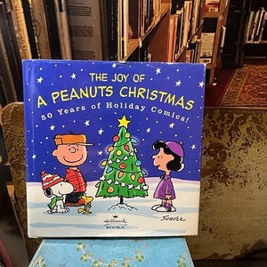 2000 Vintage The Joy of A Peanuts Christmas 50 Years of Holiday Comics Book HB w/dj Charles Schulz