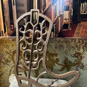 May include: A white ceramic mug with a black handle and the text "But First, Coffee" in a black, bold font. The mug is on a white surface. The mug is approximately 4 inches tall.