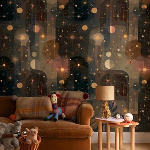 May include: A cozy living room scene with a brown sofa, patterned throw pillows, and a small side table with a leopard-print lamp. The wallpaper features a celestial design with stars and circles in gold and brown tones. A rug and toys complete the scene.