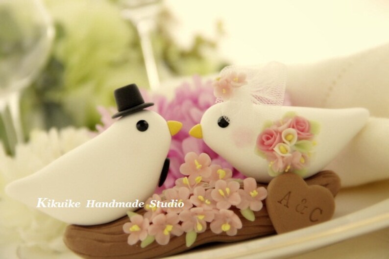 Birds with sakura cherry blossoms branch Wedding Cake Birds with sakura cherry blossoms branch Wedding Cake