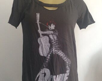 Awesome BOWIE Tee Shredded Vintage Black T-shirt.   David Bowie silver graphic with red hair, wailing on guitar.   Cool cut areas, open back