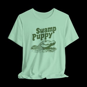 Swamp Puppy Shirt, Funny Alligator T-Shirt, Cute Gator Graphic Tee, Southern Humor, Swamp Life Gift Heather Mint