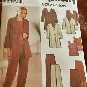May include: Simplicity sewing pattern 7186 featuring a woman's suit with a jacket and pants. The pattern includes various jacket and pants styles, with the words "easy to sew" printed on the front. The size is GG, 26W-32W.