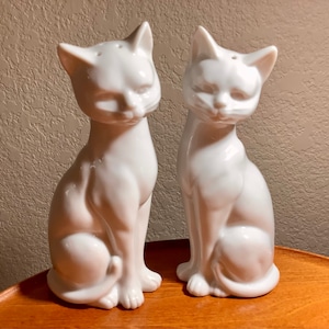White Tall Cats Ceramic Salt & Pepper Shakers | 6” tall | Good Condition one stopper opening cracked as pictured