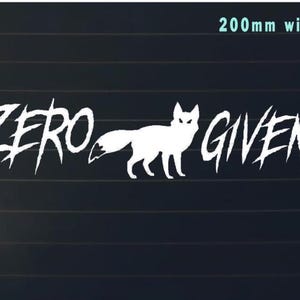May include: White vinyl decal with the text "ZERO GIVEN" in a stylised font. A white fox silhouette is between the words. The decal is 200mm wide.