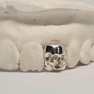 SKULL custom grillz dental caps worldwide delivery