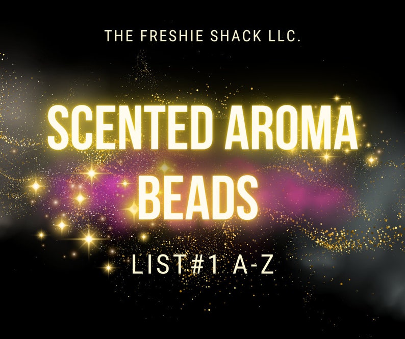 May include: A black background with a galaxy of gold glitter and a pink nebula. The text "THE FRESHIE SHACK LLC." is at the top of the image. The text "SCENTED AROMA BEADS LIST #1 A-Z" is in the center of the image.