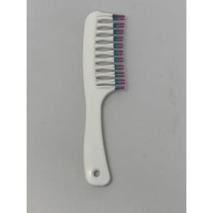 May include: A white plastic comb with a handle and a row of teeth. The tips of the teeth are painted with a combination of pink, teal, and purple colors. The comb has a hole at the end of the handle.