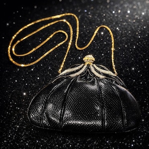 May include: A black, textured evening bag with a gold chain strap. The bag features a decorative top with crystal embellishments and a gold clasp. The background is black with sparkling accents, creating a glamorous aesthetic.