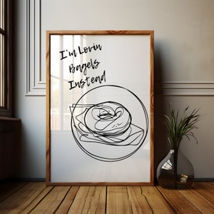 Minimalist Bagel Poster: Black and White Foodie Art